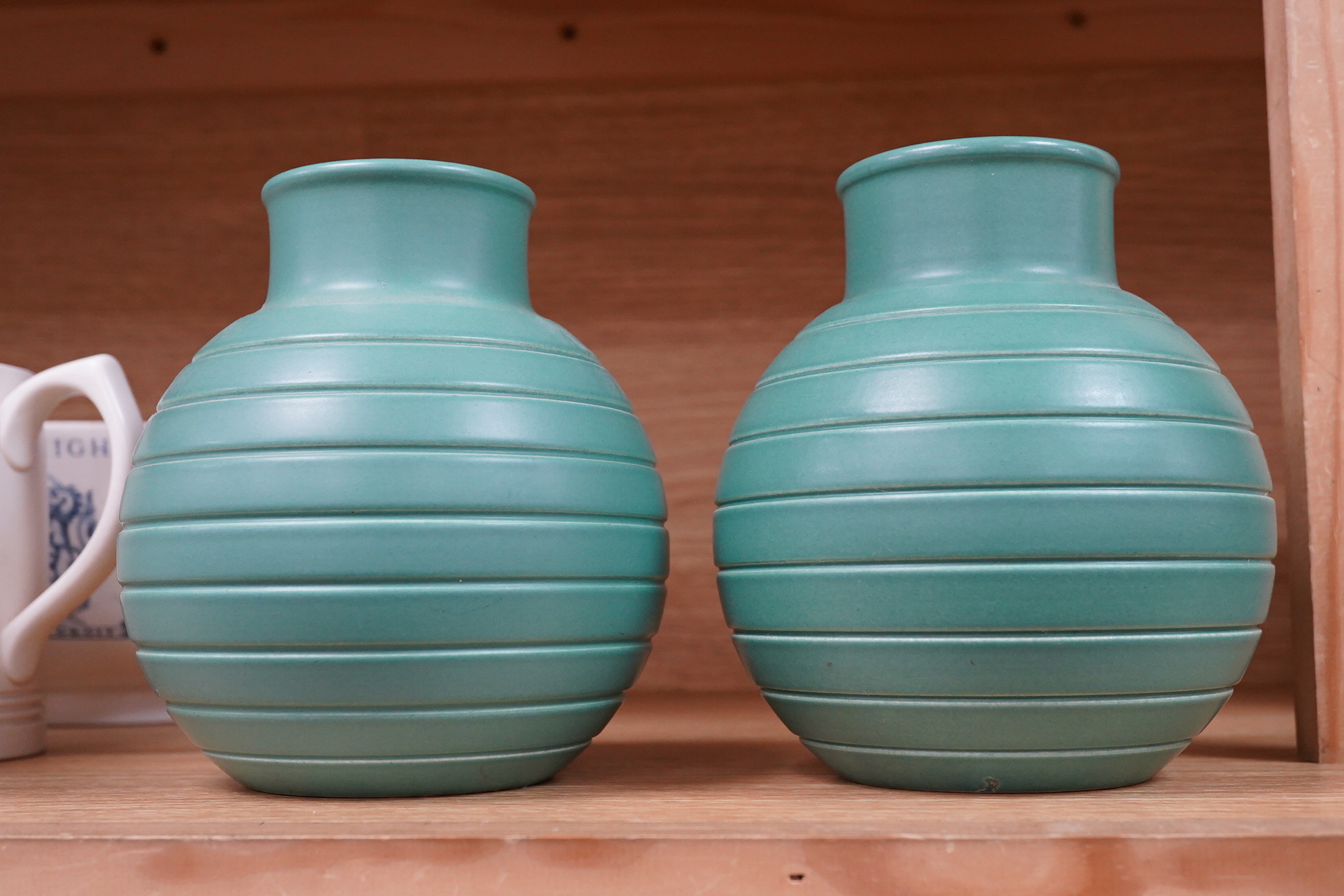 Keith Murray for Wedgwood pair of globe vases, 15.5cm